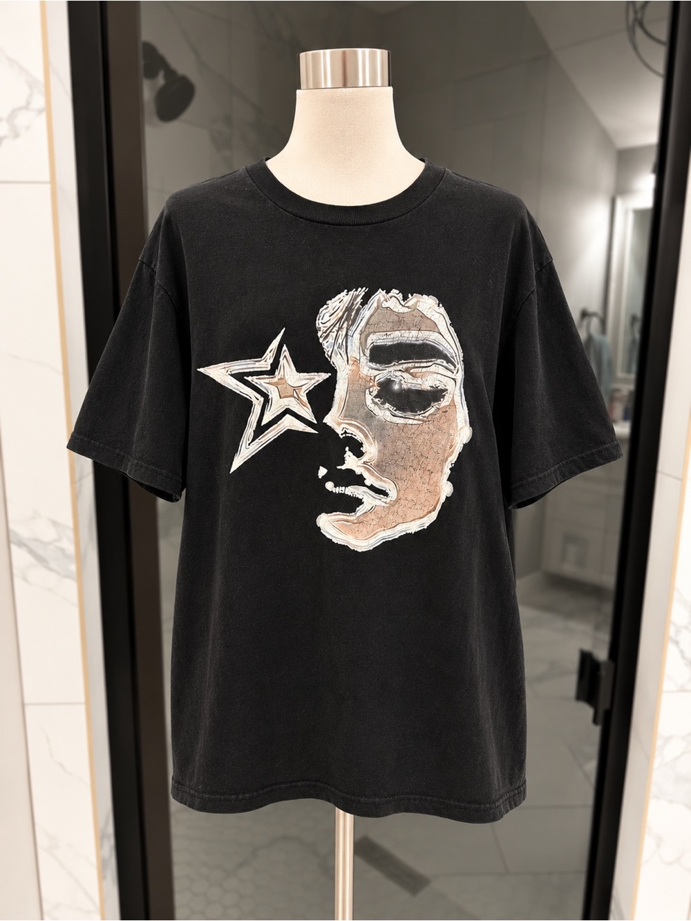Black Short-Sleeve Graphic Tee with Star & Face Motif